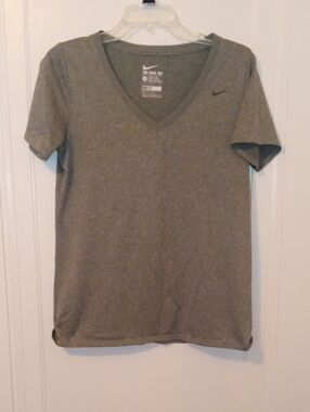 women large gray NIKE vneck drifit tee